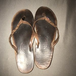 Rainbow braided flip flops